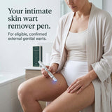 Customer holding ClariDerm during a private bathroom routine